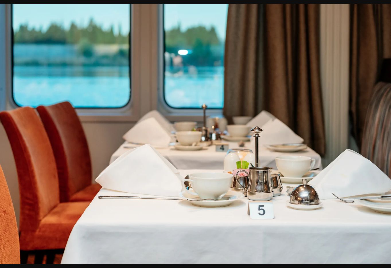 A table set for dining aboard AmaCello