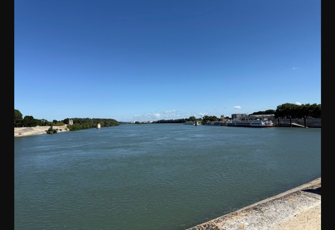 Rhône River view near Arles with a river cruise ship
