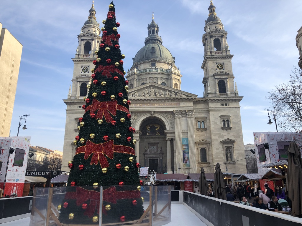 A Christmas tree and market stalls in front of St. Stephen’s Basilica in Budapest.