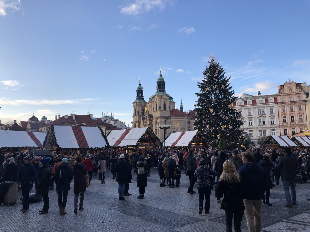 Christmas stalls and a decorated tree in Prague’s Old Town Square.
