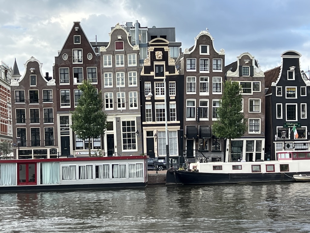 Amsterdam’s canal houses seen from the water.