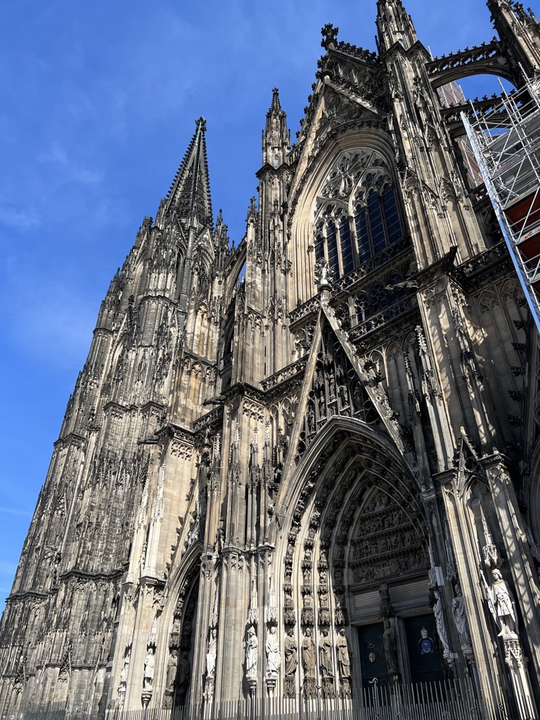 Looking up at Cologne Cathedral’s intricate stonework.