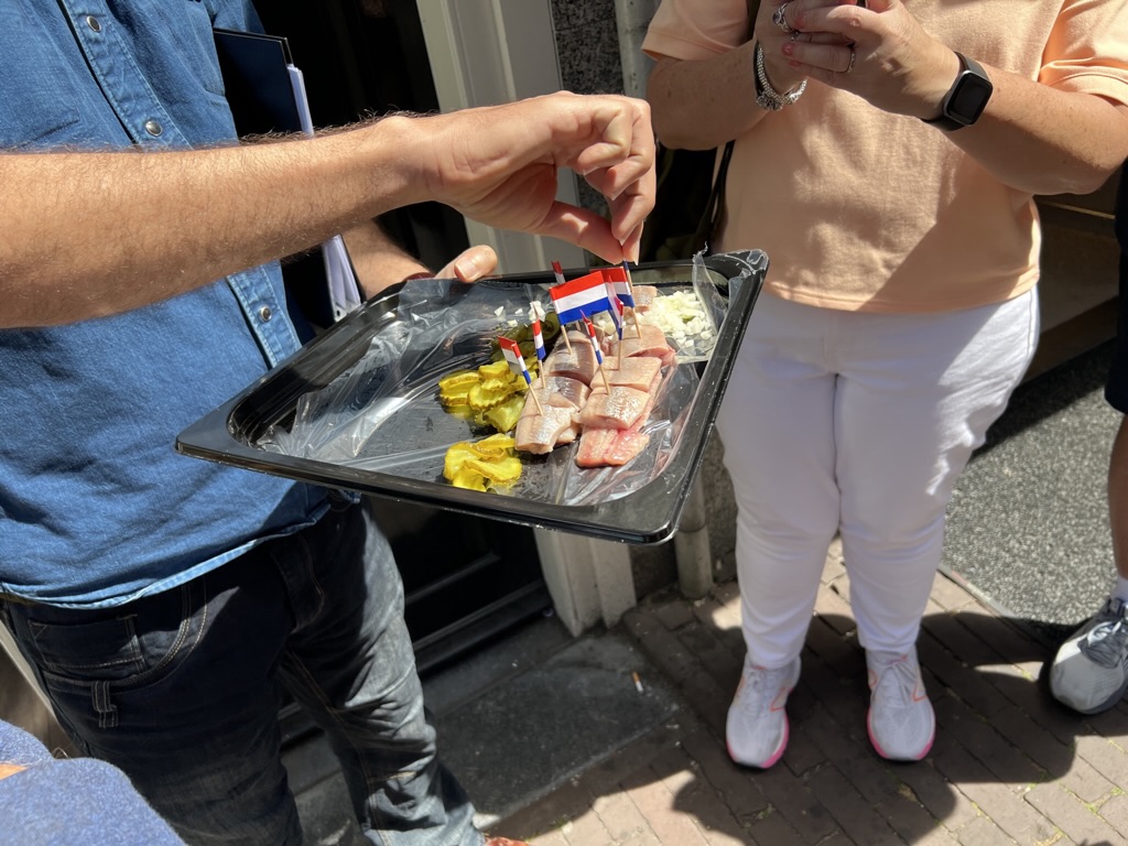 Herring with pickles and onions on our Amsterdam food tour.