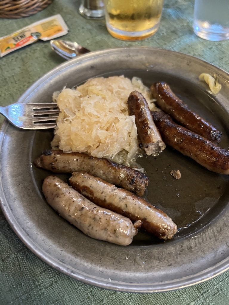 Nuremberg-style bratwurst and sauerkraut.