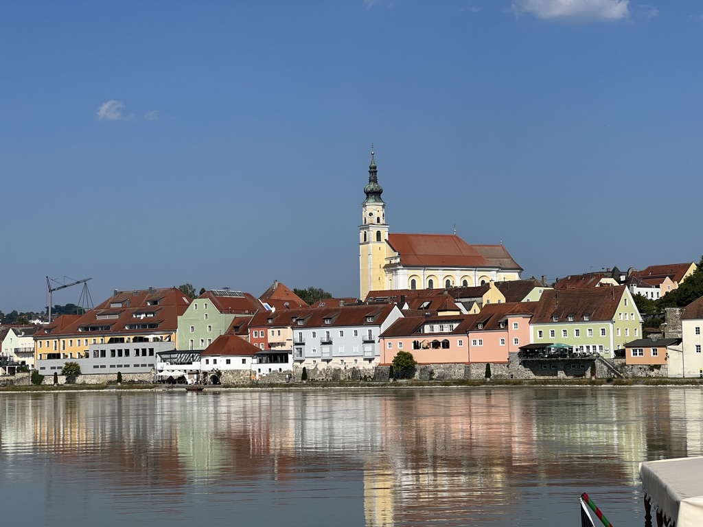 Colorful waterfront buildings during our Schärding visit.