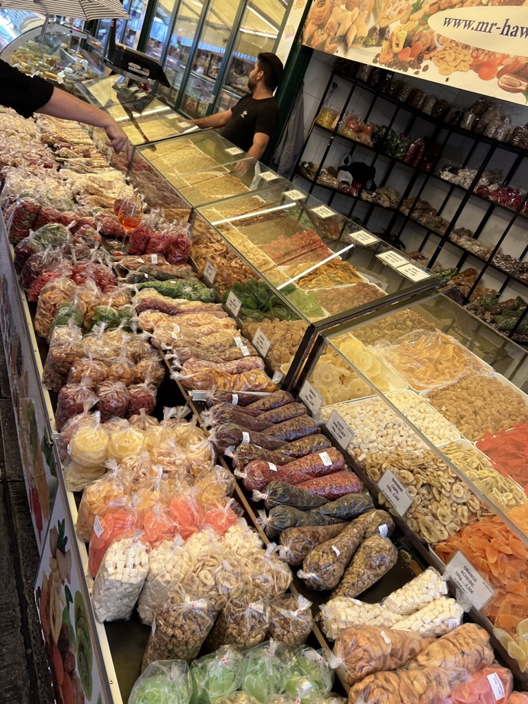 A colorful display of dried fruit and other treats on our Vienna market tour.