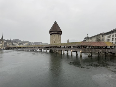 Lucerne's covered Chapel Bridge and Water Tower over the river